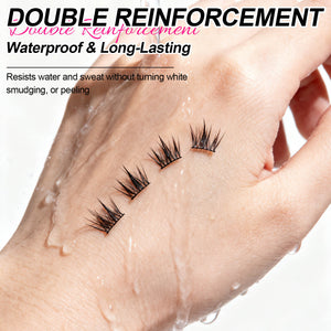 False eyelashes on a hand with water droplets, emphasizing waterproof and long-lasting properties.
